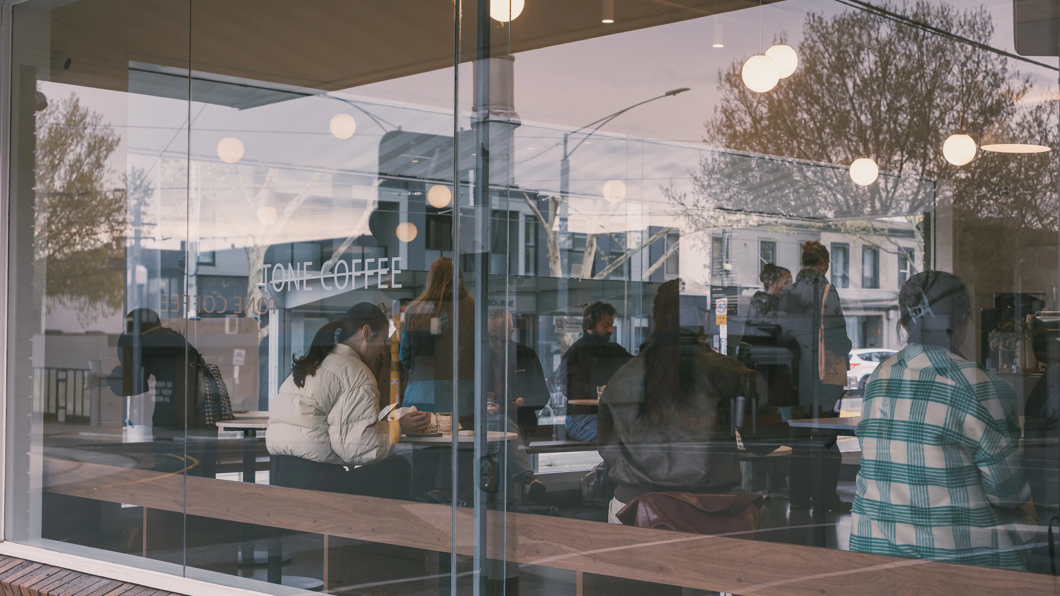 Tone Coffee Roasters interior and coffee preparation